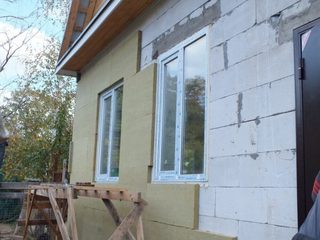 Утепление и отделка фасада дома из газобетона